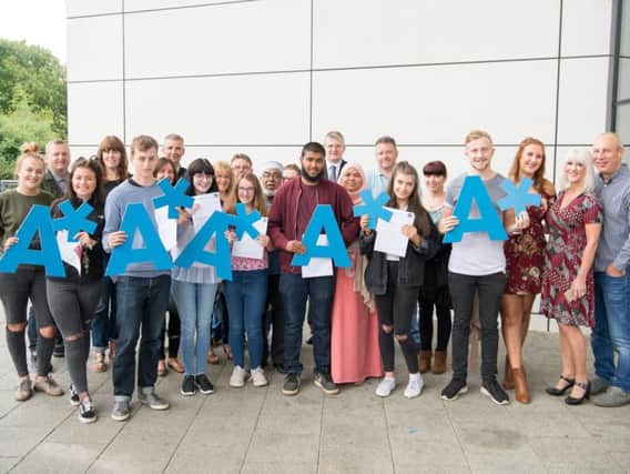 Burnley College students celebrate their results