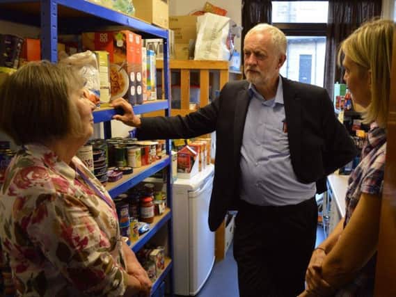 Jeremy Corbyn chats to volunteers at the West Craven Food Bank