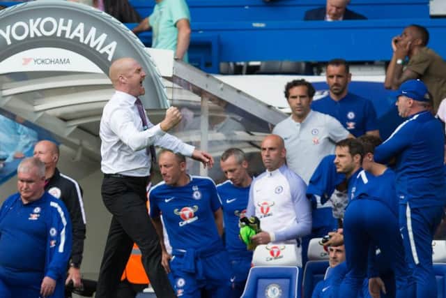 Sean Dyche celebrates the opening day victory over Chelsea at Stamford Bridge