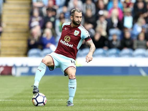Steven Defour controls the ball against West Brom