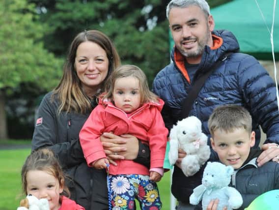 A family enjoys Padiham's Party in the Park