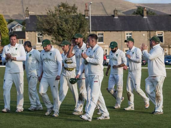 Clitheroe players celebrate their win over Haslingden last Saturday. Photo: Keith Driver
