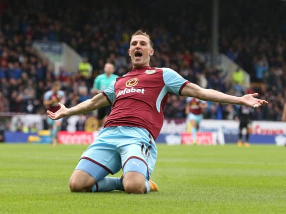 Chris Wood celebrates after putting the Clarets ahead in the opening moments