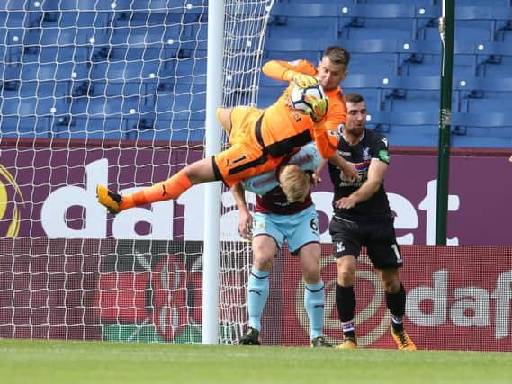 Tom Heaton fell awkwardly after collecting a cross