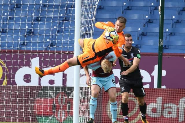 Tom Heaton fell awkwardly after collecting a cross