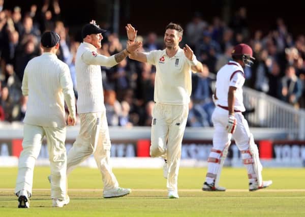 England's James Anderson celebrates with Ben Stokes (left) after bowling West Indies' Kraigg Brathwaite to take his 500th Test wicket during day two of the Third Investec Test match at Lord's, London. PRESS ASSOCIATION Photo. Picture date: Friday September 8, 2017. See PA story CRICKET England. Photo credit should read: Adam Davy/PA Wire. RESTRICTIONS: Editorial use only. No commercial use without prior written consent of the ECB. Still image use only. No moving images to emulate broadcast. No removing or obscuring of sponsor logos.