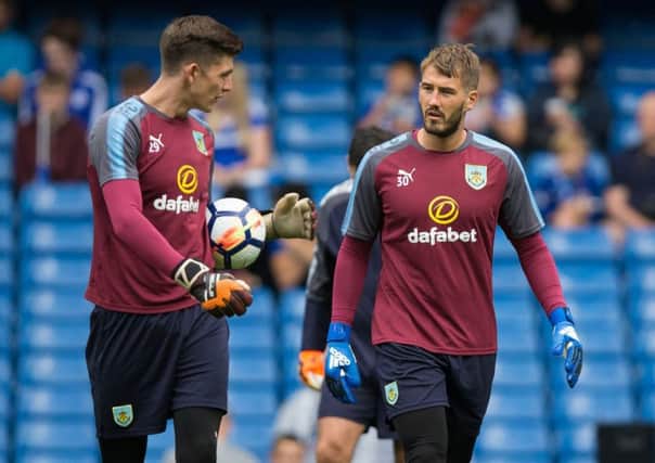 Burnley's Adam Legzdins (right) talks with team mate Nick Pope

Photographer Craig Mercer/CameraSport

The Premier League - Chelsea v Burnley - Saturday August 12th 2017 - Stamford Bridge - London

World Copyright Â© 2017 CameraSport. All rights reserved. 43 Linden Ave. Countesthorpe. Leicester. England. LE8 5PG - Tel: +44 (0) 116 277 4147 - admin@camerasport.com - www.camerasport.com