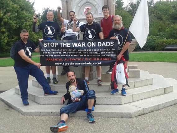 Akeib Mahmood (back row, second from left) on the Justice for Dads walk.