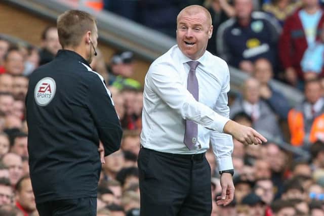 Burnley manager Sean Dyche remonstrates with fourth official Mike Jones

during Saturday's game