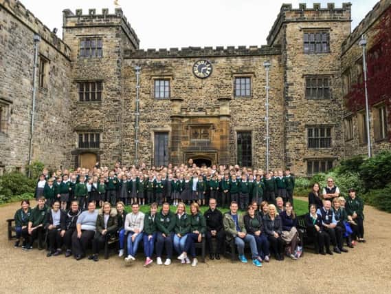 Students and staff from Padiham Green Primary School in front of the magnificent Towneley Hall.
