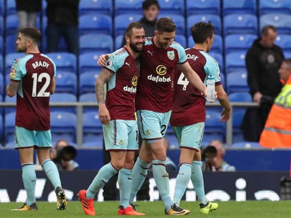 Steven Defour and Stephen Ward celebrate at full time