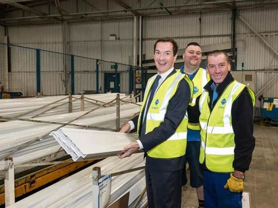 George Osborne with two VEKA workers in Burnley
