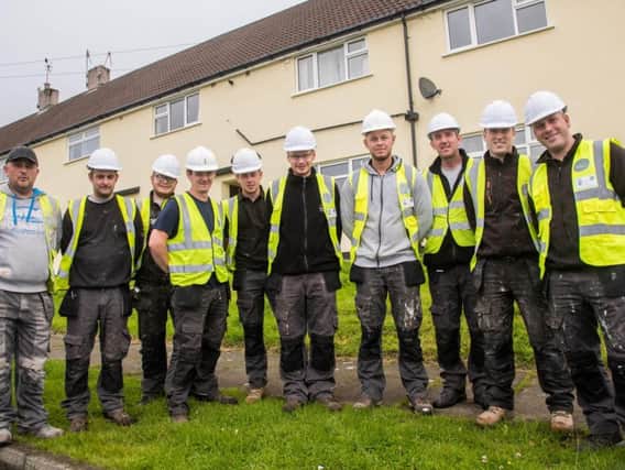 Staff from Ring Stones, part of the Calico Group, set up to create jobs, build new homes and renovate properties