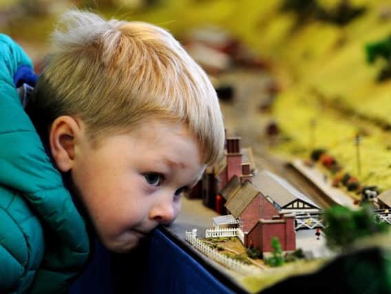 A budding young enthusiast at last year's Model Railway exhibition which will be held next month in Padiham.