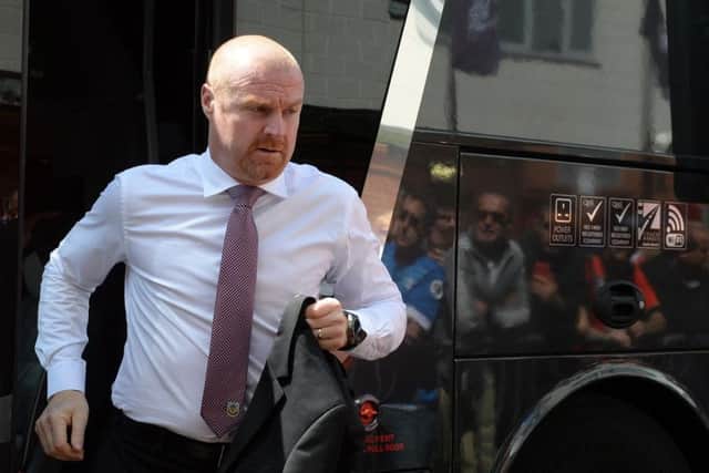 Burnley manager, Sean Dyche, getting of the team bus.