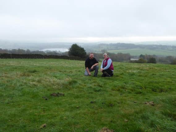 Archaeologist Mike Woods and Rachel Turner pictured at the site of the planned dig