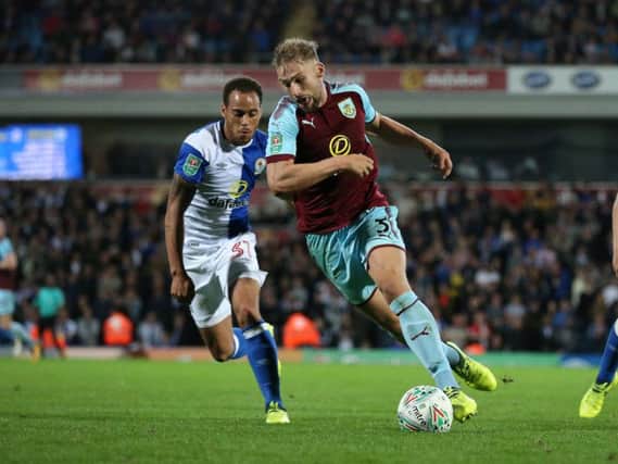 Charlie Taylor in action for the Clarets against Blackburn in the Carabao Cup