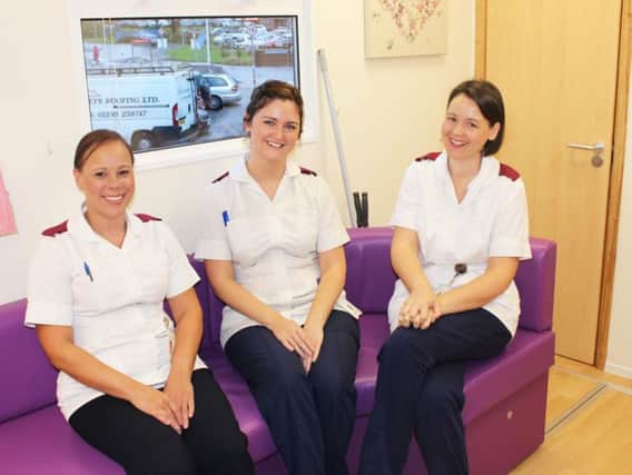 Mammographers Charlotte McConnell, Nicola Bradley, and Zoe Walsh ready to welcome women to the new East Lancashire Breast Screening Service Mobile Unit.