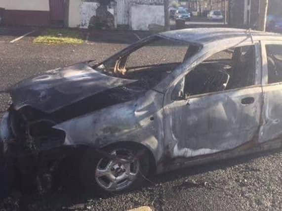 A burnt out car is the aftermath of Bonfire Night in Brierfield.