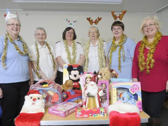 Pictured at the launch of this year's Christmas Toy Appeal at the Salvation Army citadel in Burnley are (from left to right) Janet Raven, Jean Steele, Cpt Maisie Veacock, Major Ann Silcock, Christine Hunt and Burnley Express reporter Sue Plunkett.