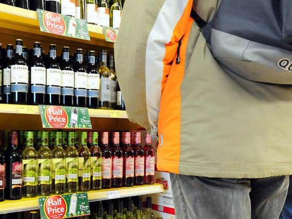 Two shops in a UK city centre are using breathalysers on customers