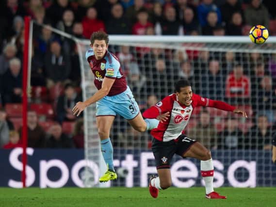 Clarets defender James Tarkowski battles for possession with Southampton's Virgil van Dijk