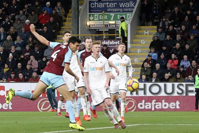Jack Cork heads the Clarets into the lead