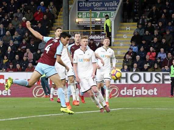 Jack Cork heads the Clarets into the lead