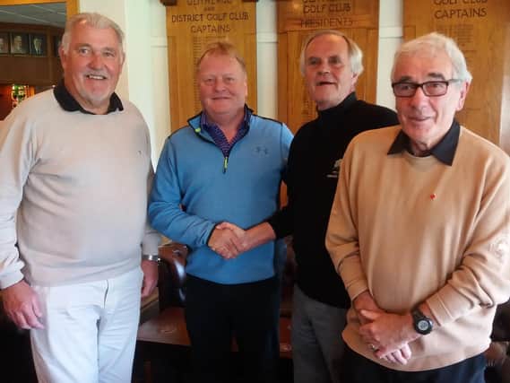 The outgoing Seniors Captain Ron Mason is pictured welcoming the new Seniorscaptain Frank Potter (second left) watched by the Seniors captain-elect Peter Hargreaves and Seniors secretary Ian Lambert
