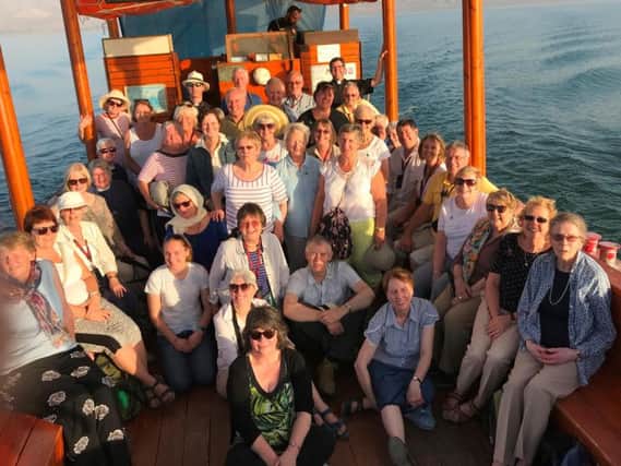 The Bishop and parishioners on the Sea of Galilee