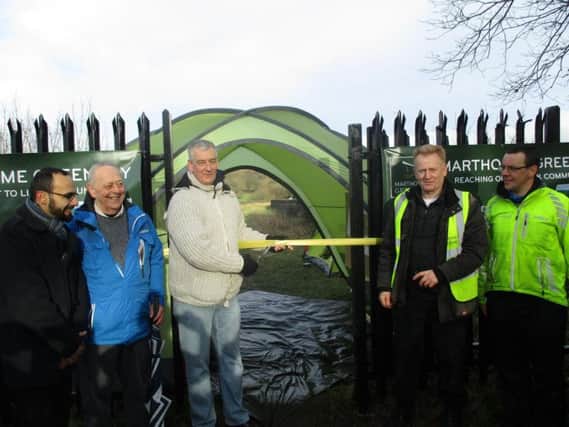 MP Graham Jones prepares to cut the ribbon to open the Martholme Viaduct with (from left to right)  Great Harwood councillor Noodad Aziz, Rawden Kerr, who is the Great Harwood town crier,  John Barker, chairman of Martholme Greenway and Will Heynes from Sustrans.