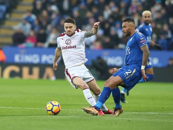 Burnley's Robbie Brady and Leicester City's Danny Simpson