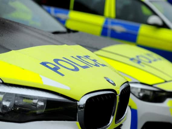 Detectives in Burnley have launched an investigation after a pensioner was left with serious head injuries when he was attacked with a hammer as he answered his front door.