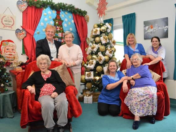 Staff and residents at Cravenside Care Home enjoy their new Christmas tree