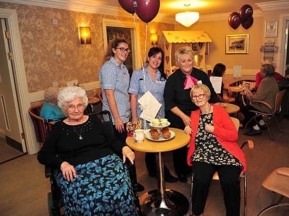 Staff Holly Laird and Shaunie Murgatroyd with residents Maria Copley and Kathleen Jones. (s)