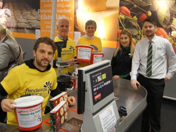 Jay Rodriguez helps out at Marks and Spencer in Burnley