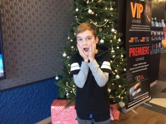 Robbie Dixon (10) re-enacts the classic pose from Home Alone before the special screening of the film at Burnley's Reel Cinema.