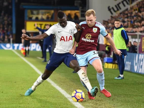 Tottenham's Davinson Sanchez battles with Scott Arfield