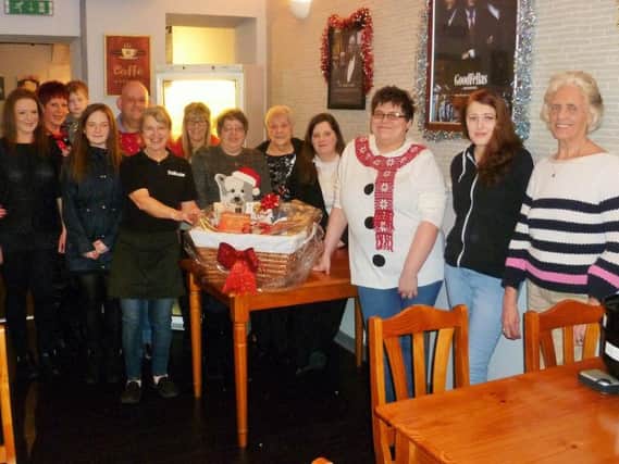 Staff, friends and family of Karen Baron with the hampers
