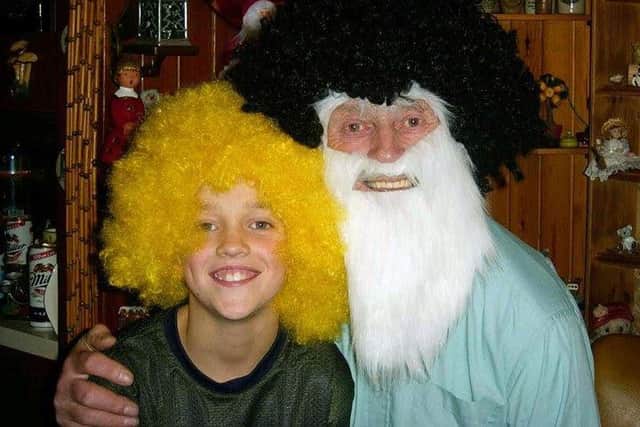A younger Josh Hindle making fun memories with his grandfather, Dennis. (s)