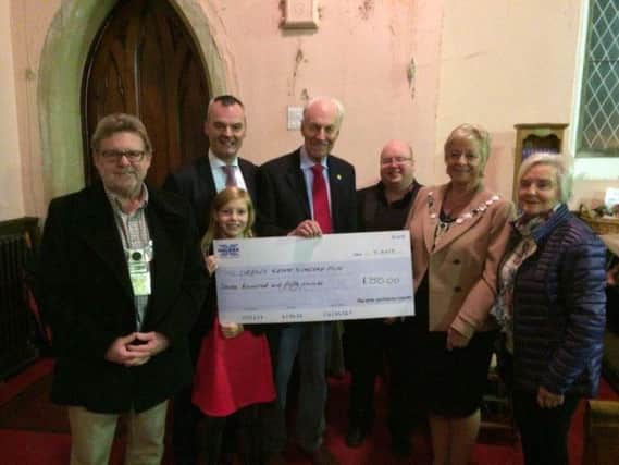 Pictured at the presentation of the cheque to the Children's Heart Surgery Fund are (left to right) the Mayor of the Ribble Valley Coun. Richard Bennett, Amelie
Brown, Julian Brown of the Childrens Heart Surgery Fund, concert organiser Barry Brown, Ellis Thompson, from the string quartet, Mayoress of Ribble Valley Marilyn Davies and Maureen Brown.