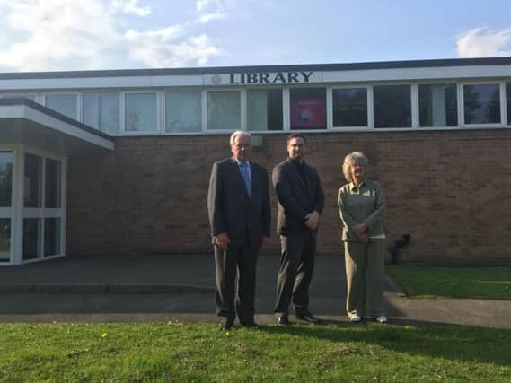 Coun. Ken Turner, County Coun. Christian Wakeford and Coun. Linda Crossley outside Barrowford Library.