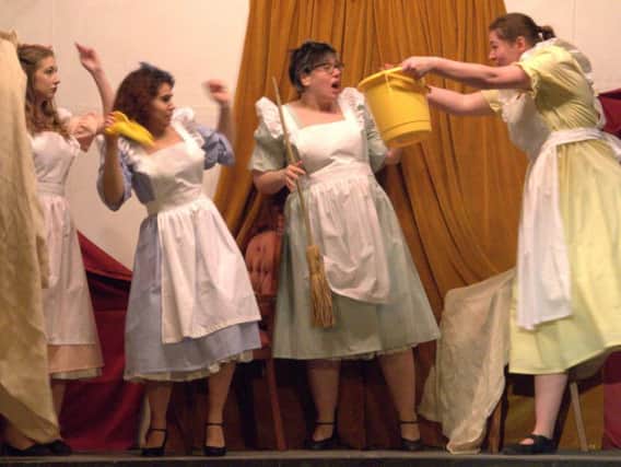 Rebecca Munday, Em Parkinson, Kirsty Lauder and Helen Parkinson as the maids in Greenbrook Panto Society's Cinderella.