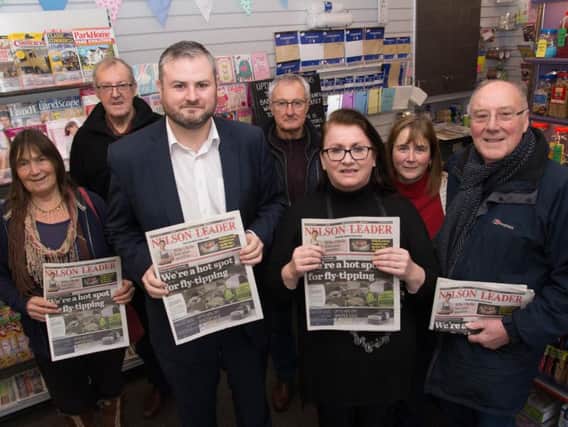 MP Andrew Stephenson (front) at Park News in Barrowford with owner Julie MacAdam, Barrowford parish councillor Sue Nike (left) and other supporters of the campaign to stop Booths from selling newspapers.