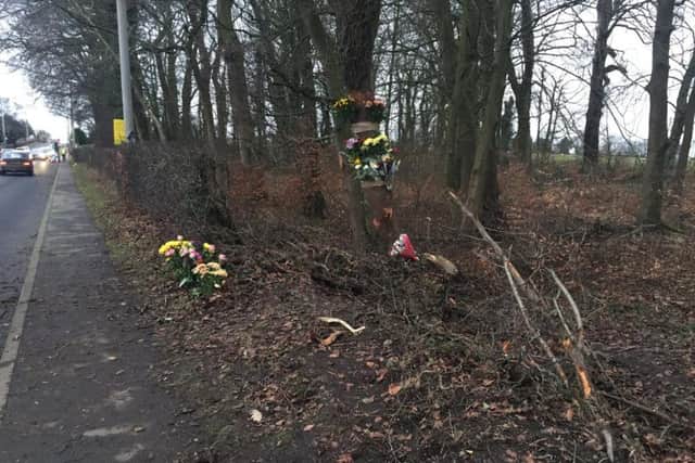 Floral tributes have been left at the scene where Adnan Nazir died
