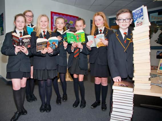 Shuttleworth College students choose their books for the reading and story writing challenge.