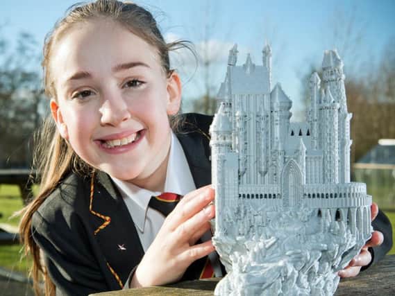 Lucy Thompson with her 3D Cinderella castle model