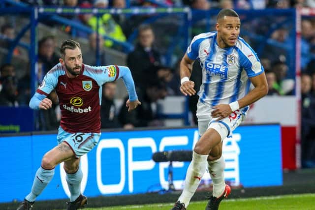 Steven Defour in action against Huddersfield Town