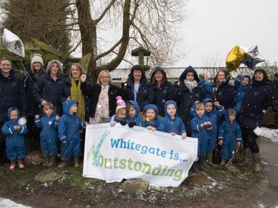 Staff and children at Whitegate Nursery School in Padiham celebrate being rated as outstanding by Ofsted for third time.