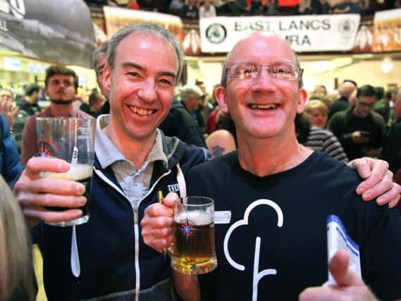 Drinkers enjoy a pint in Colne
